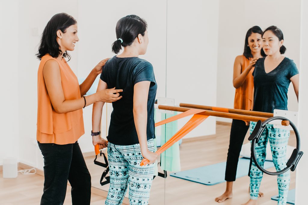 Postnatal woman doing gentle exercise after c-section Singapore