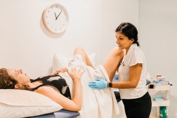 Women's health physiotherapist assessing pelvic floor function at Embrace Physiotherapy, Katong Singapore